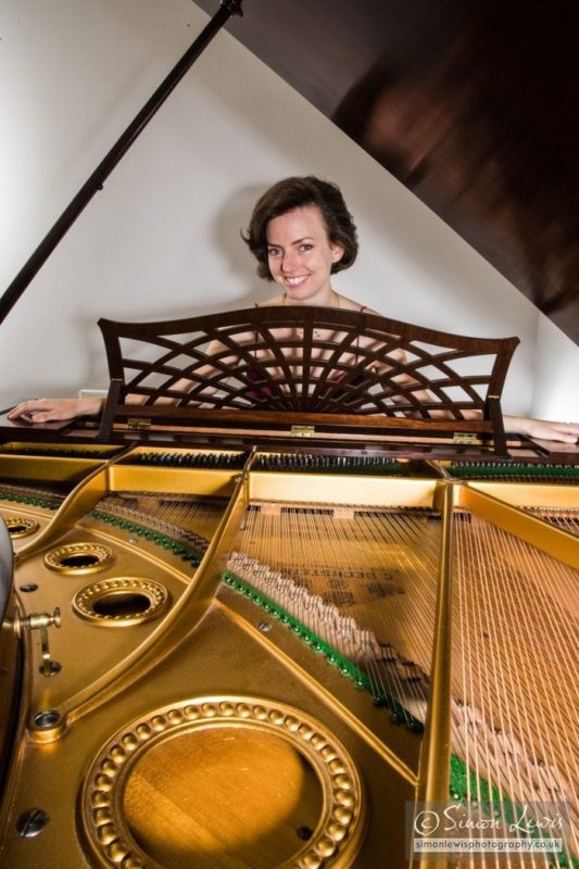 Elizabeth Benedetto portrait with grand piano