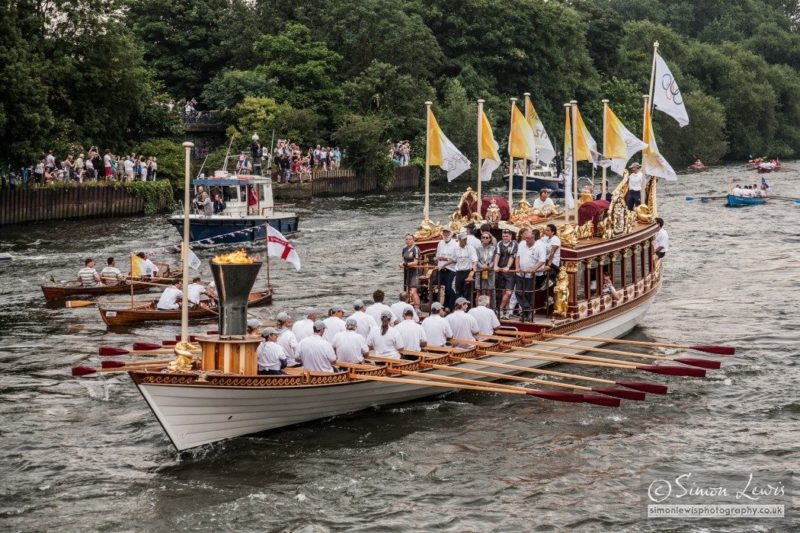 Gloriana transporting olympic torch on the thames