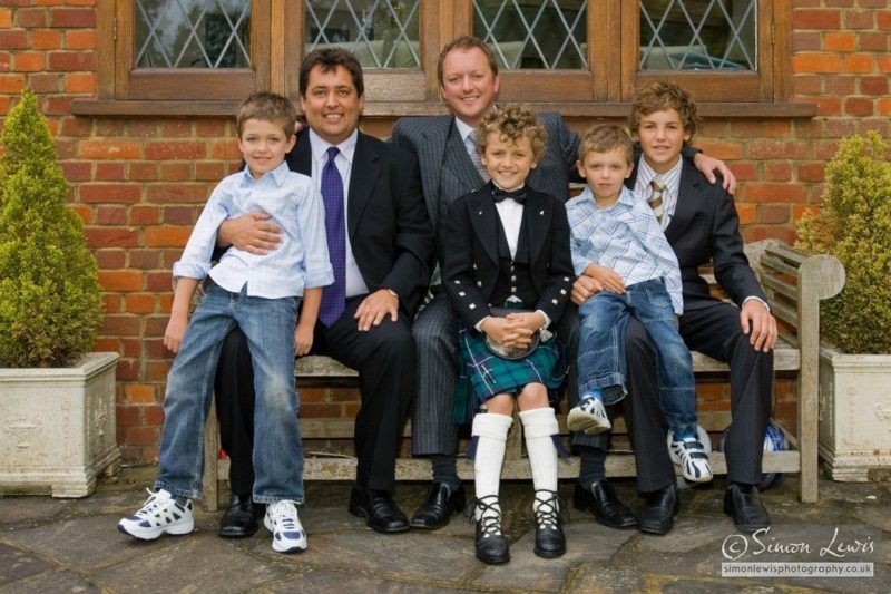 family group shot of fathers with their boys