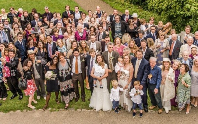 large wedding party group shot taken from above